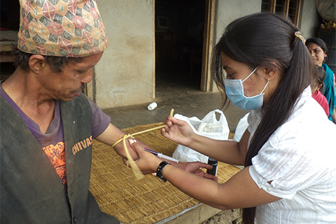 Administering injection in Nepal