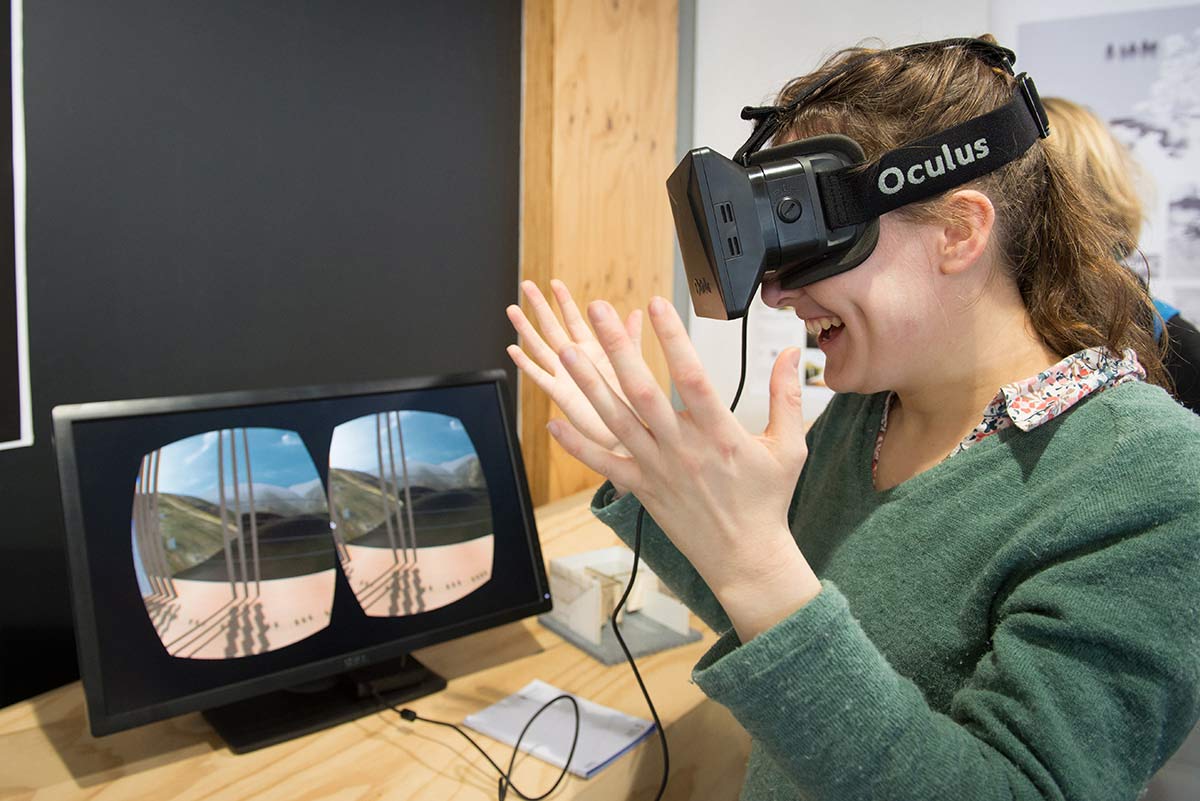 Female student using oculus rift